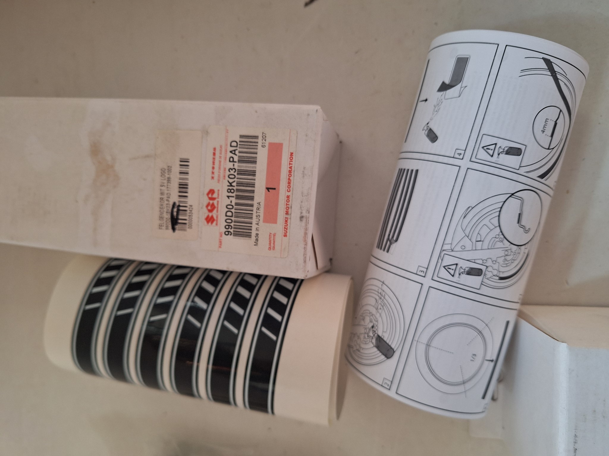 Picture of SUZUKI  FELGENDEKOR MIT SV LOGO  990D0-18K03-PAD